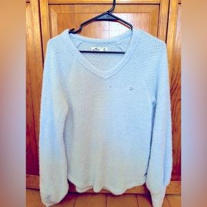 XS light blue Hollister sweater, two small holes
